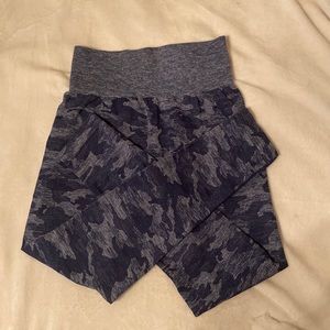 Great condition, little stretch not a lot, athletic material